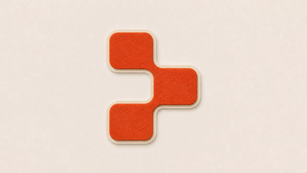 A continuous brick-orange felt shape with three rounded square lobes on a cream felt backing